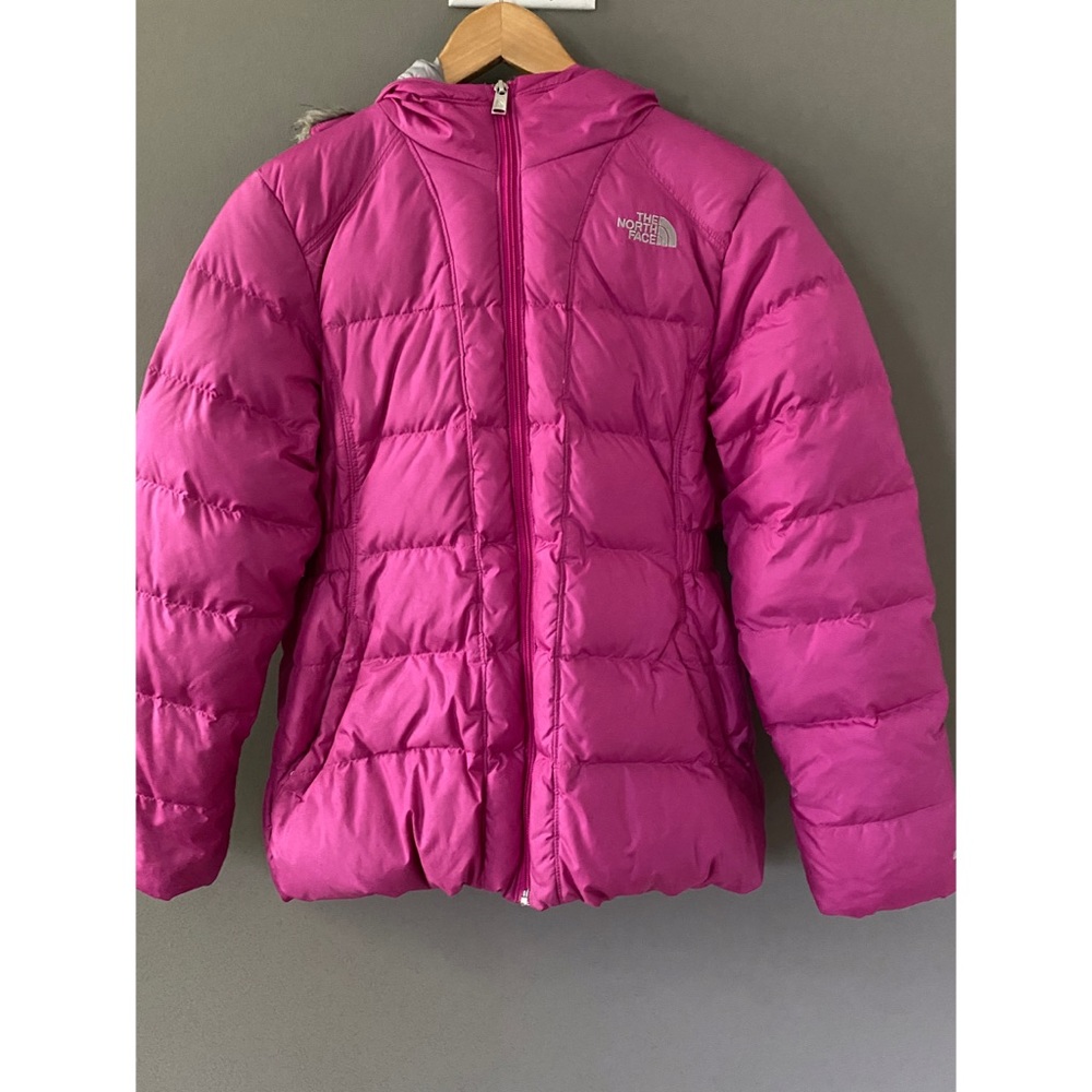The North Face girl’s pink puffer jacket
